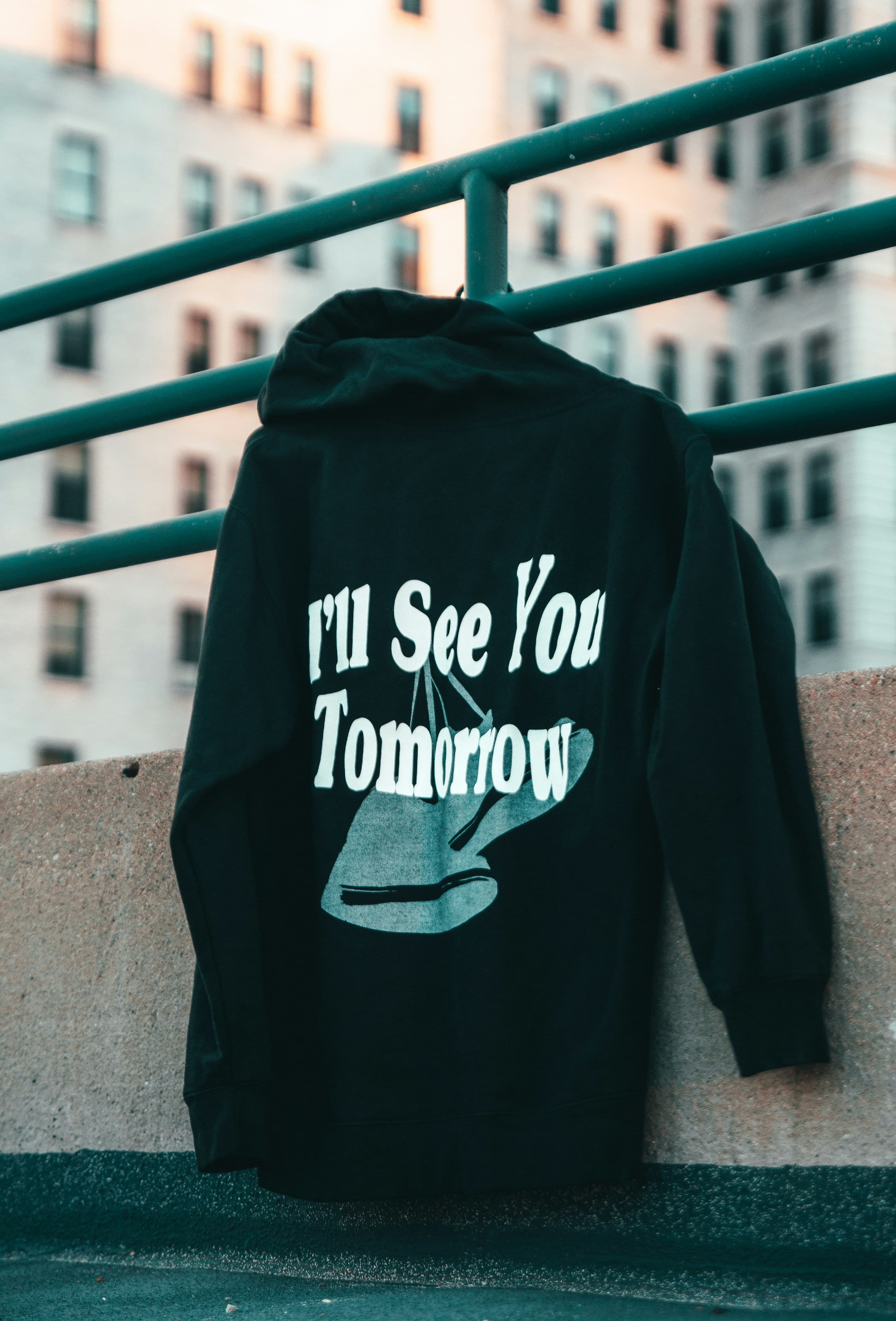 Black Rejig hoodie with a statement print