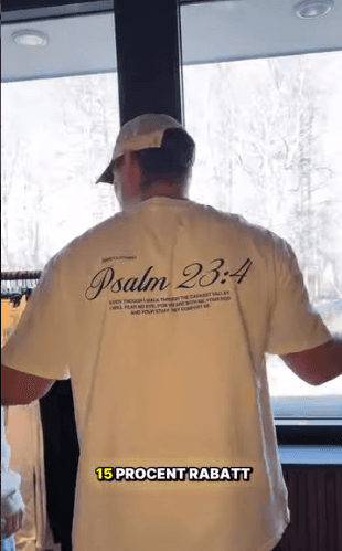 Person wearing a Psalm 23:4 tee