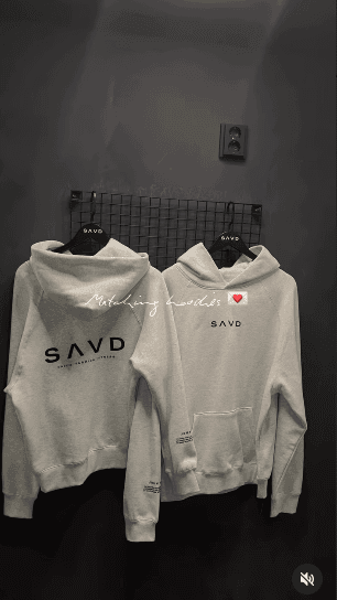 Grey Rejig hoodies on a rack